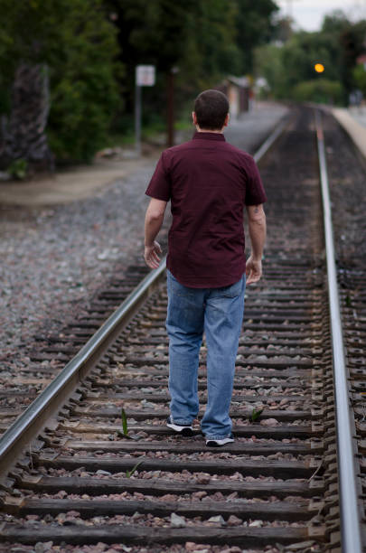 istock Walking along the railroad tracks. 657320510