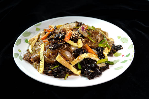 istock Korean dish made from sweet potato noodles - Japchae 657326784