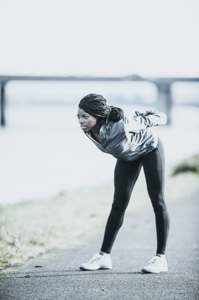 istock African American woman stretching before jogging 657351658