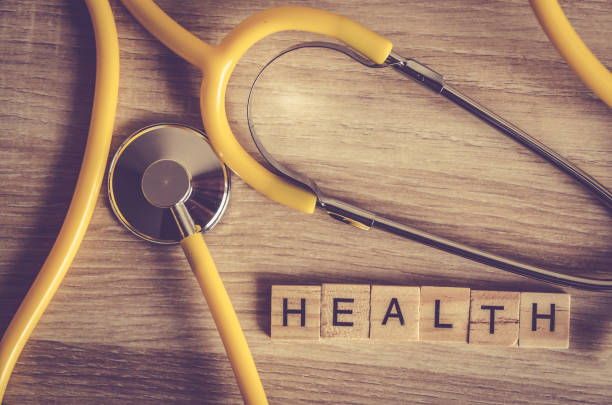 istock health word background on wood blocks 657351886