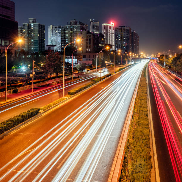 istock urban traffic with cityscape 657356514