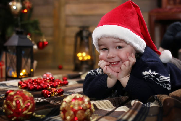 istock small child playing with toys with christmas decorations 657356656
