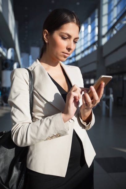istock Busy lady reading message on smartphone 657360032