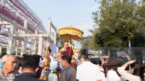 People Offering Food And Items To A Buddhist Monk Stock Photo - Download Image Now - Adult, Alms, Asia