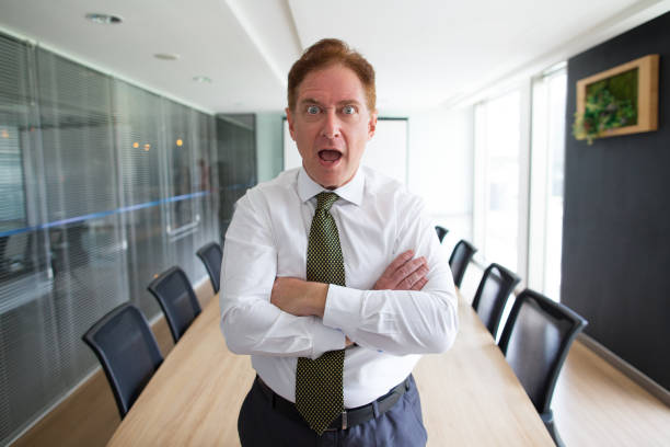 istock Surprised senior businessman with open mouth 657360684