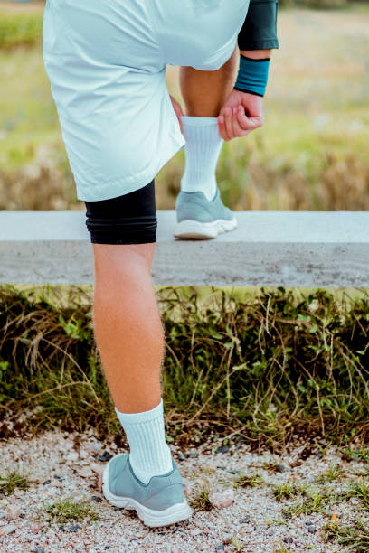 istock Young Athlete Tying his Show Laces 657362816