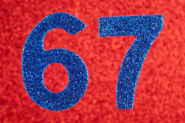istock Number sixty-seven blue color over a red background. Anniversary. 657367100