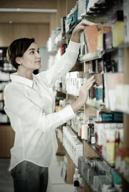 istock Female customer searching for reliable drug 657367486