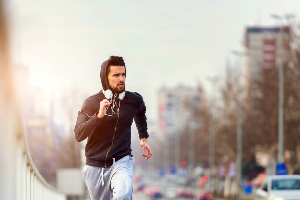 istock Handsome Urban Runner Having Intensive Training Outdoors 657369136