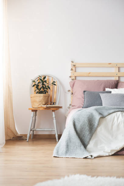 istock Chair and bed in bedroom 657371460