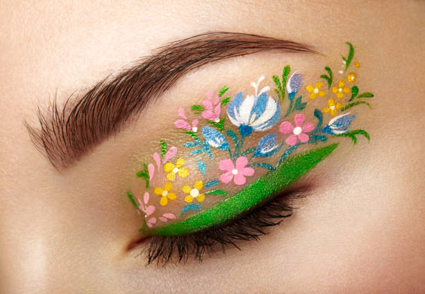 istock Eye makeup girl with a flowers 657371494