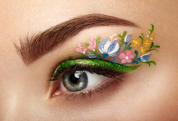 istock Eye makeup girl with a flowers 657372520