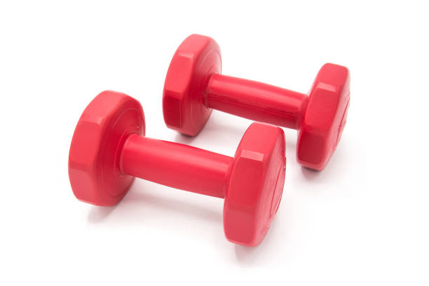 istock Two red plastic dumbell isolated on white top view 657378392