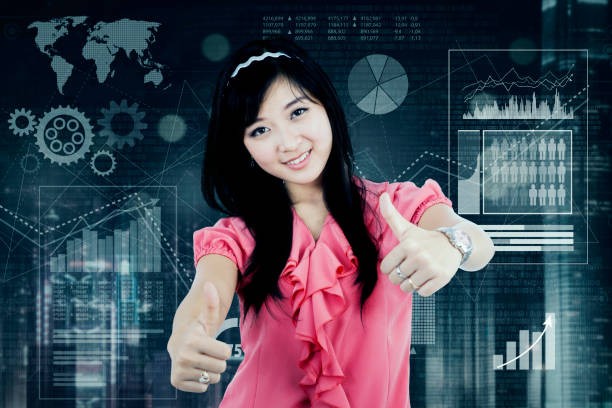 istock Woman shows thumbs up with virtual screen 657382832
