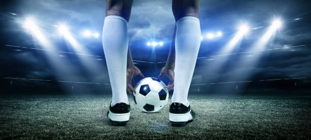 istock Football player with ball 657385400