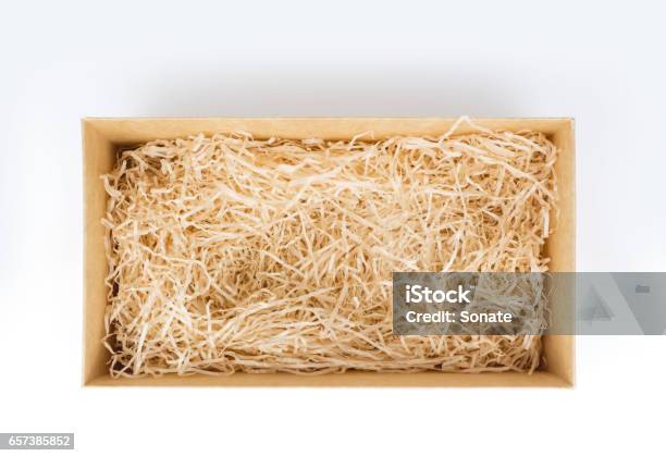 Open Gift Box With Decorative Straw Top View Stock Photo - Download Image Now - Straw, Wine, Wood - Material