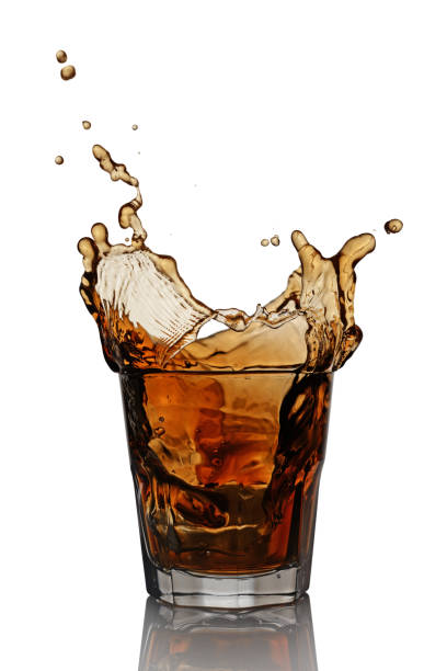 istock Splash in glass of scotch whiskey 657389036