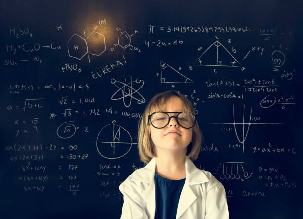 little girl education blackboard konzept - mathematics mathematical symbol child intelligence stock-fotos und bilder