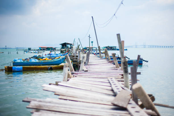 istock Wooden pier on the sea background 657408134