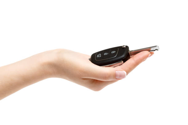 istock Female hand holds car keys. 657408334