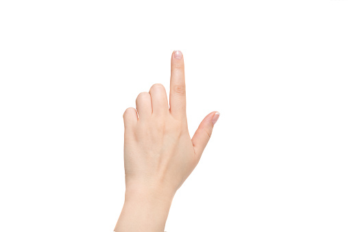 Isolated female index finger on a white background.