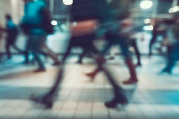 Blurred background. Pedestrians hurrying to transport