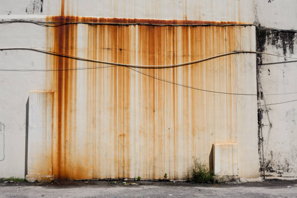 istock Rusty dirty moldy wall outdoor 657415084