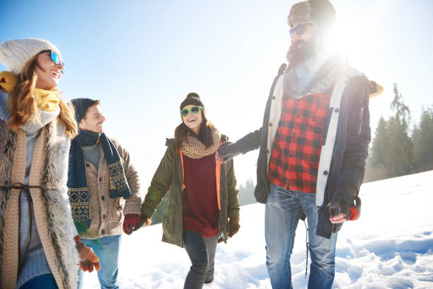 istock Happy couple having fun over winter background 657418852