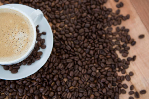 istock Cup of coffee with roasted coffee beans 657421120