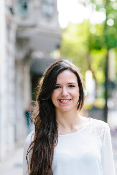 istock Cheerful young woman looking at camera 657421792
