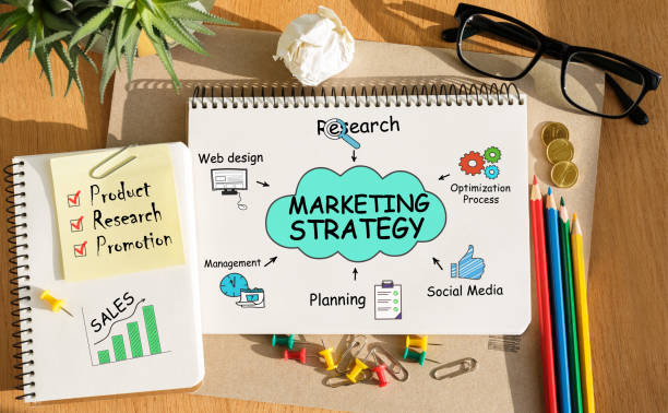 istock Notebook with Toolls and Notes about Marketing Strategy 657425118
