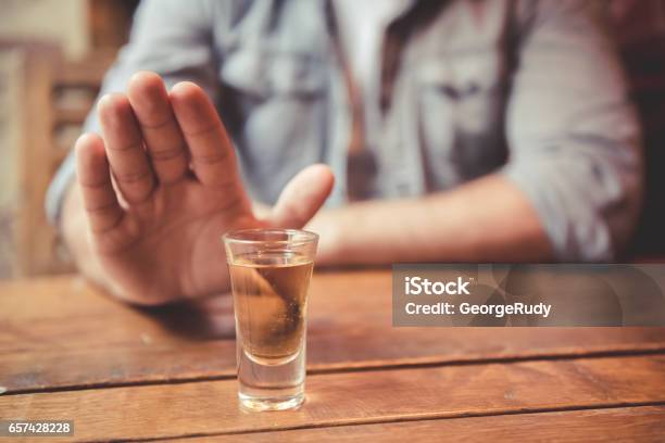 Guy At The Pub Stock Photo - Download Image Now - Alcohol Abuse, Alcohol - Drink, Refusing