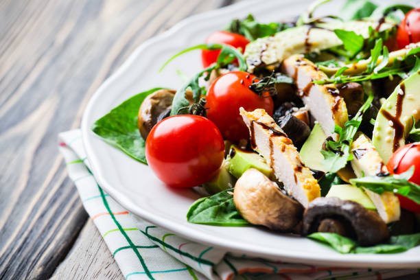 istock Chicken salad with avocado and spinach 657428382