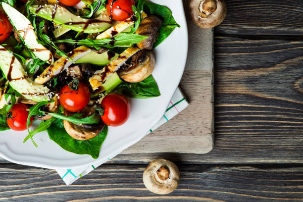 istock Chicken salad with avocado and spinach 657428416