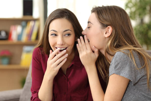 istock Gossip friend telling a secret 657428418