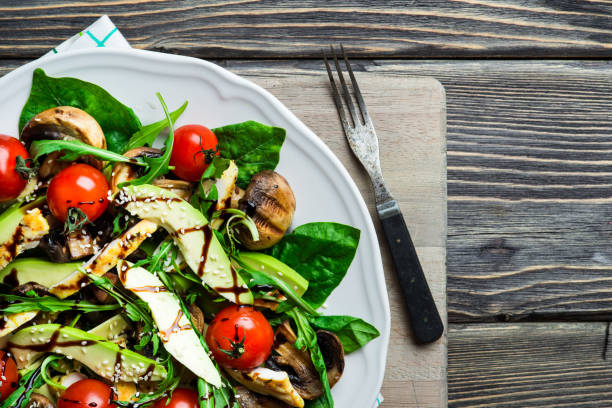 istock Chicken salad with avocado and spinach 657428420