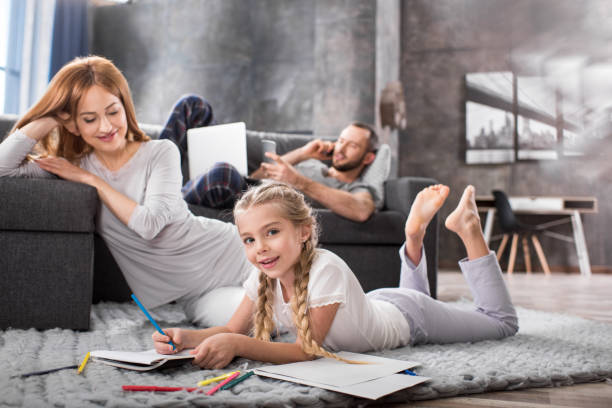 istock Mother and daughter drawing 657429860