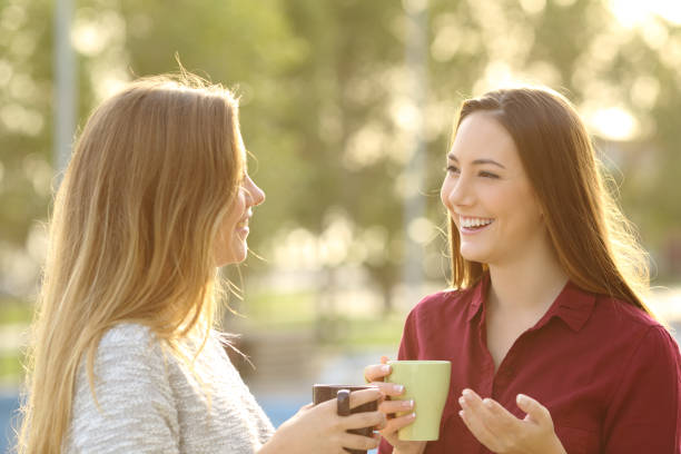 istock Two friends talking outdoors 657432690