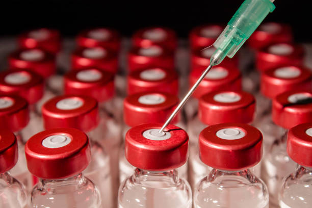 istock injeccion medicine bottles and needle 657435588