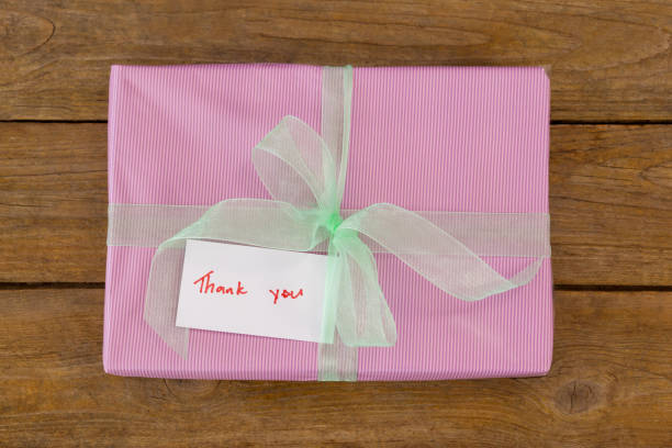istock Thank you card with gift box on table 657435972
