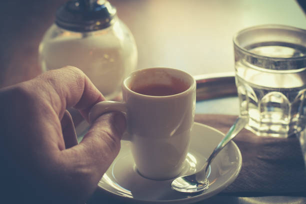 istock cup of Espresso in hand 657436360