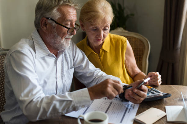 istock Senior Couple Insurance Appication Form 657445802