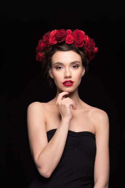 istock woman with roses wreath on head 657446358
