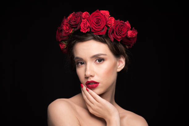 istock woman with roses wreath on head 657449842