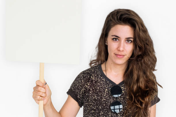 istock Woman Holding Placard Studio Concept 657453222