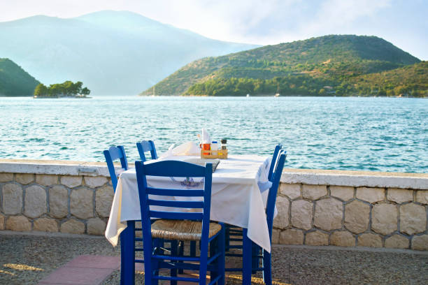 greek tavern at Ithaca island Greece greek tavern in front of the sea at Ithaca island Greece ithaca stock pictures, royalty-free photos & images