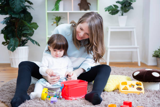 istock Parent-child play in a room 657456240