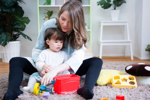 istock Parent-child play in a room 657456254
