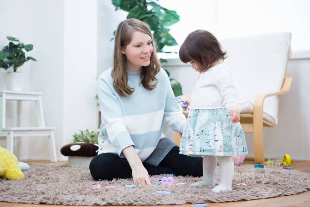 istock Parent-child play in a room 657456502