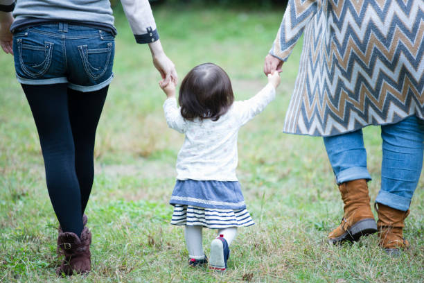 istock Parents and children to walk in the Park 657459748